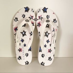 NWOT Coach star flip flops
